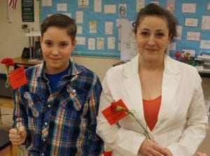 Aden Fillion, left, stopping for a photo with his mother, Jessica Fillion, right.